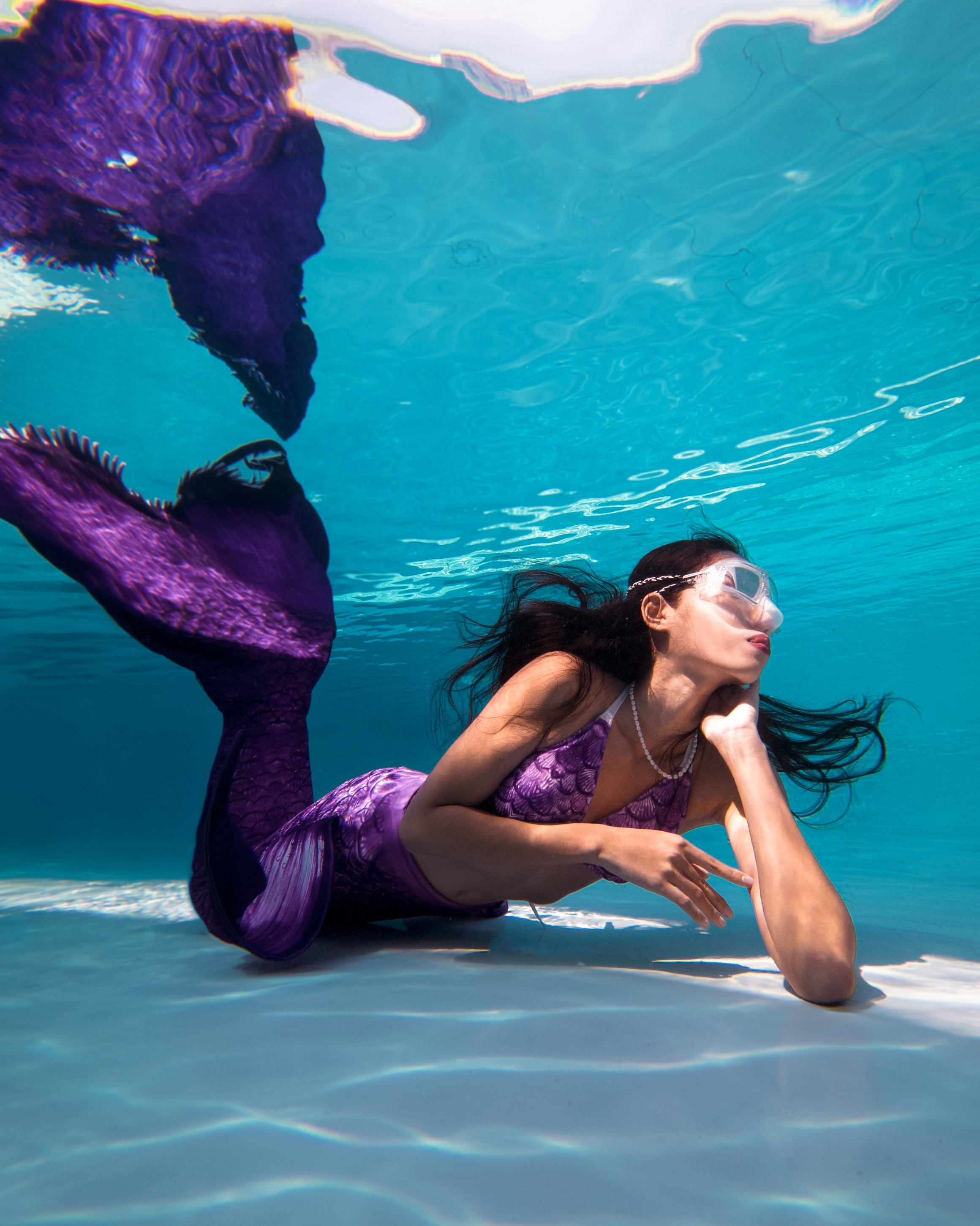 Mermaid pose underwater